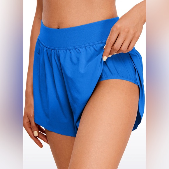 Feathery-Fit Soft Mid Rise Dolphin Lined Shorts 4'' - Picture 4 of 5